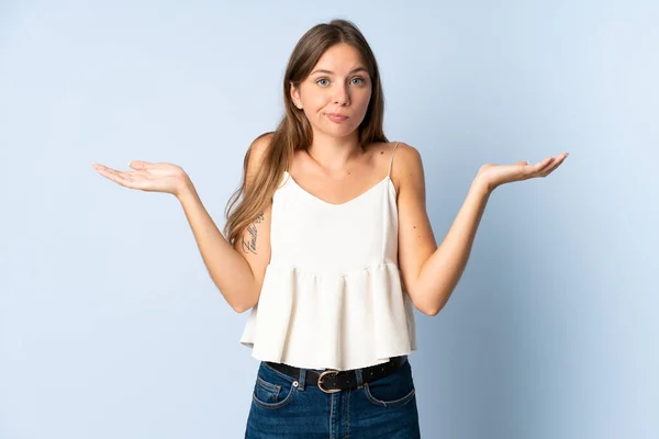 Young Lithuanian Woman Isolated Blue Background Having Doubts While Raising — Stock Photo, Image