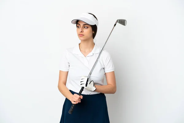 年轻英俊的高尔夫球手女人 背景洁白 从侧面看 — 图库照片