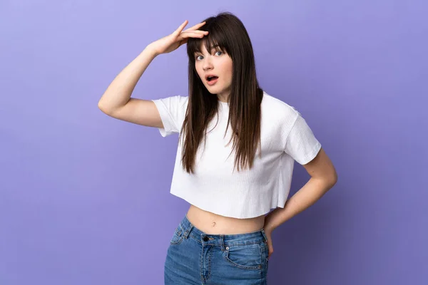 Young Ukrainian Woman Isolated Purple Background Doing Surprise Gesture While — Stock Photo, Image