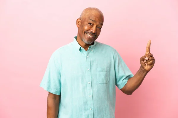 Cuban Senior Isolated Pink Background Showing Lifting Finger Sign Best — Stock Photo, Image