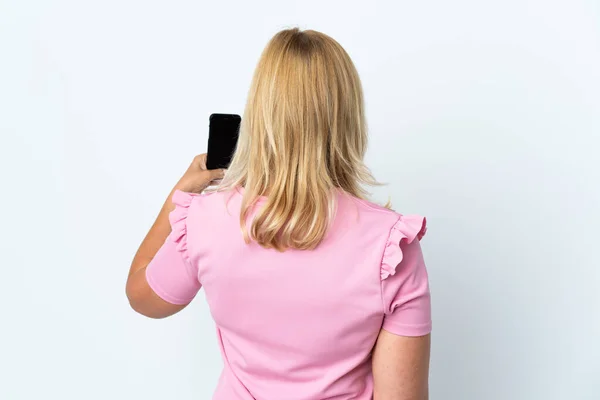 Medelålder Med Mobiltelefon Isolerad Vit Bakgrund Baksätet — Stockfoto