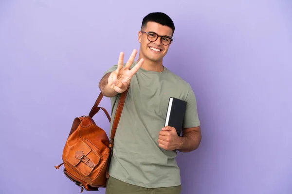 Guapo Estudiante Hombre Sobre Aislado Fondo Feliz Contar Tres Con — Foto de Stock