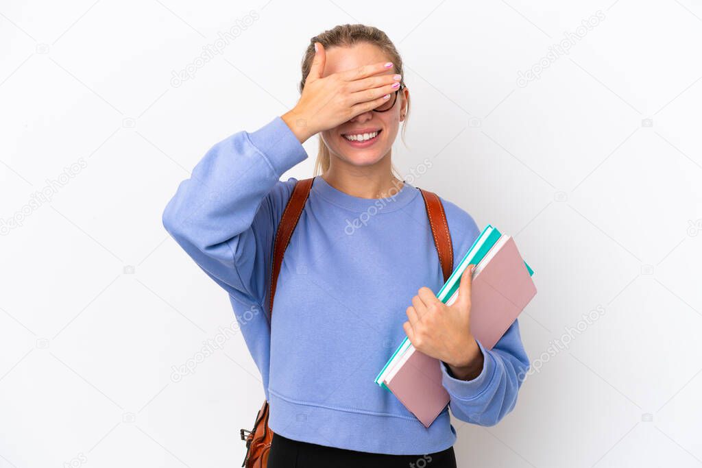 Young student caucasian woman isolated on white background covering eyes by hands. Do not want to see something