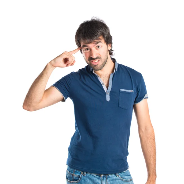 Hombre haciendo gesto loco sobre fondo blanco — Foto de Stock