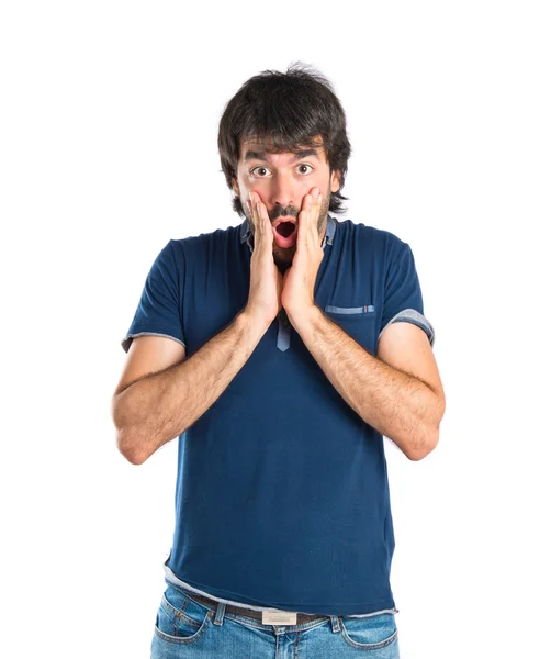 Man doing surprise gesture over white background — Stock Photo, Image