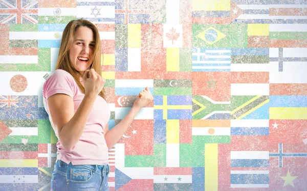 Lucky girl over flags background — Stock Photo, Image