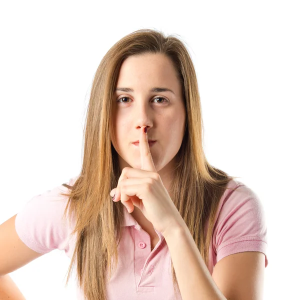 Menina fazendo gesto de silêncio sobre fundo branco isolado — Fotografia de Stock