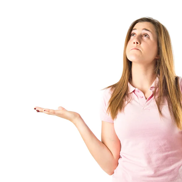 Girl having doubts over isolated white background — Stock Photo, Image