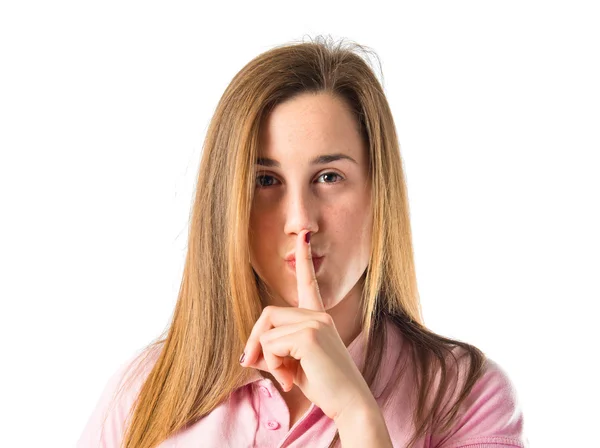 Girl making silence gesture over isolated white background — Stock Photo, Image