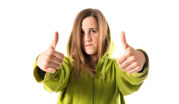 Young girl making Ok sign over white background — Stock Photo, Image