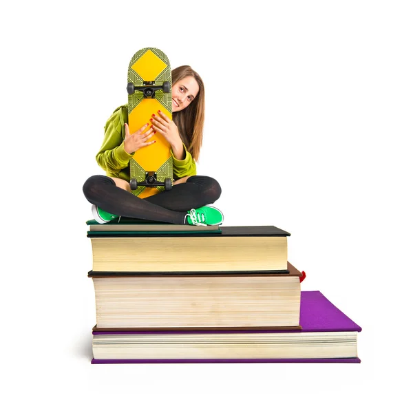 Pretty young girl wearing urban style on books — Stock Photo, Image