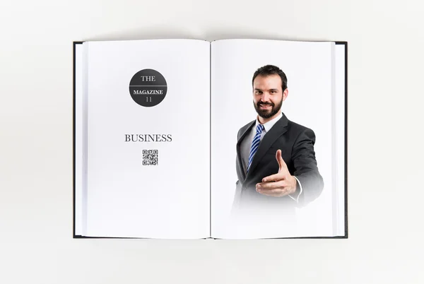 Zakenman maken een deal gedrukte op boek — Stockfoto