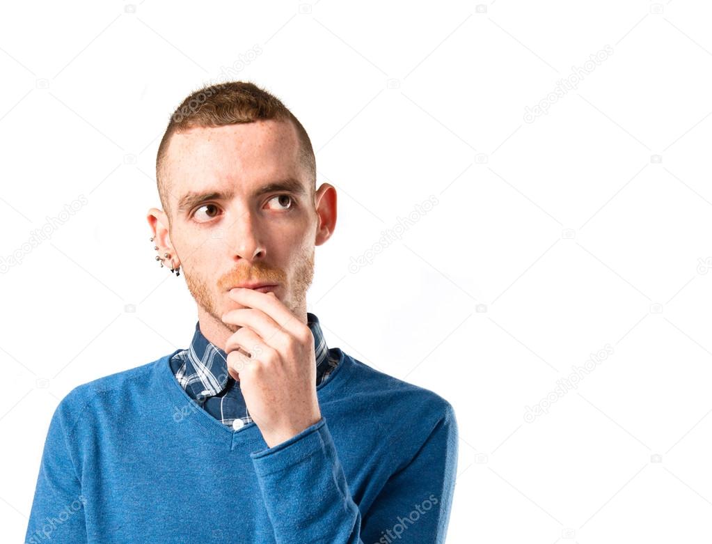 Man thinking over isolated white background 