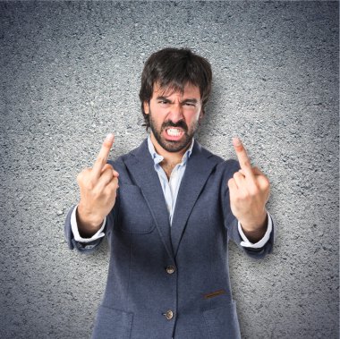 boynuz jest yaparak işadamı dokulu arka plan 