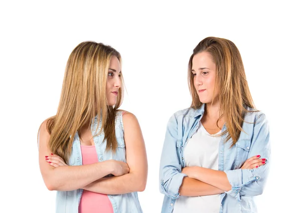 Friends with arms crossed over white background — Stock Photo, Image