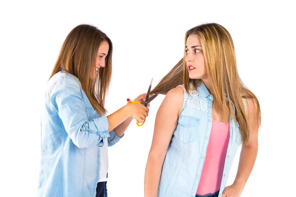 Meninas com tesoura sobre fundo branco — Fotografia de Stock