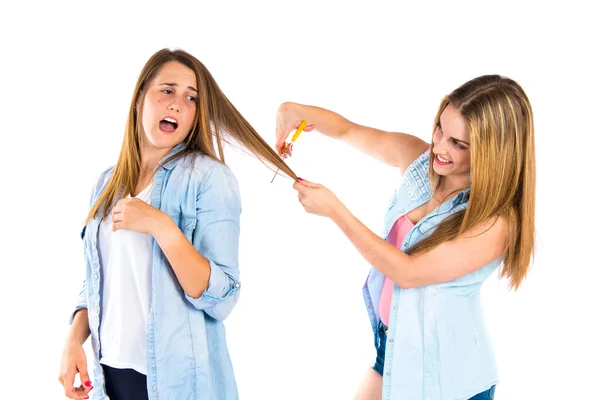 Girls with scissors over white background — Stock Photo, Image