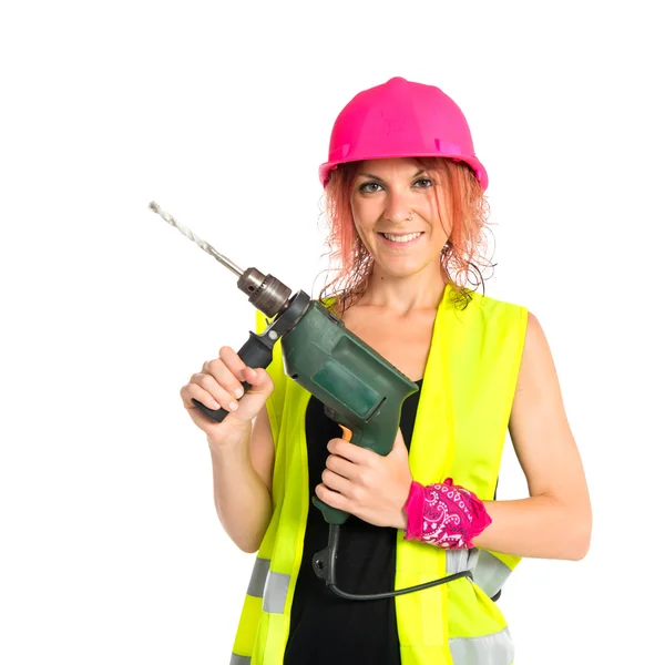 Lavoratore donna con trapano su sfondo bianco — Foto Stock