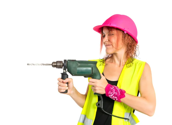 Mujer trabajadora con taladro sobre fondo blanco — Foto de Stock