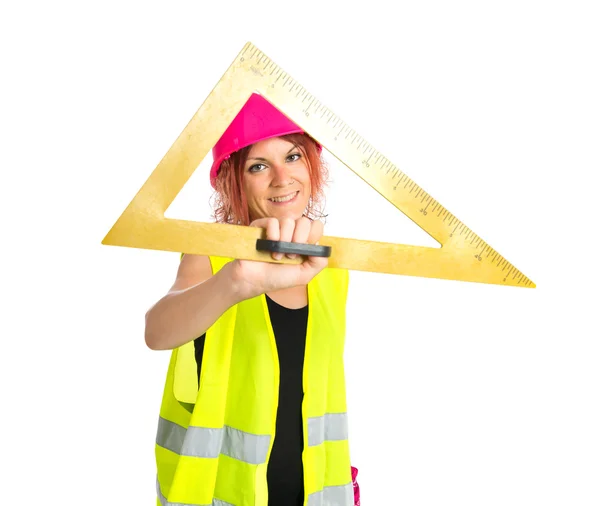 Arbeiterfrau mit Schräge vor weißem Hintergrund — Stockfoto