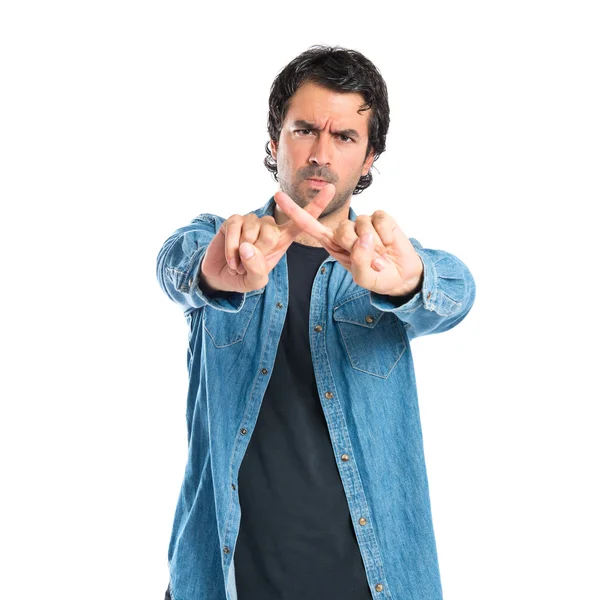 Man doing NO gesture over white background — Stock Photo, Image