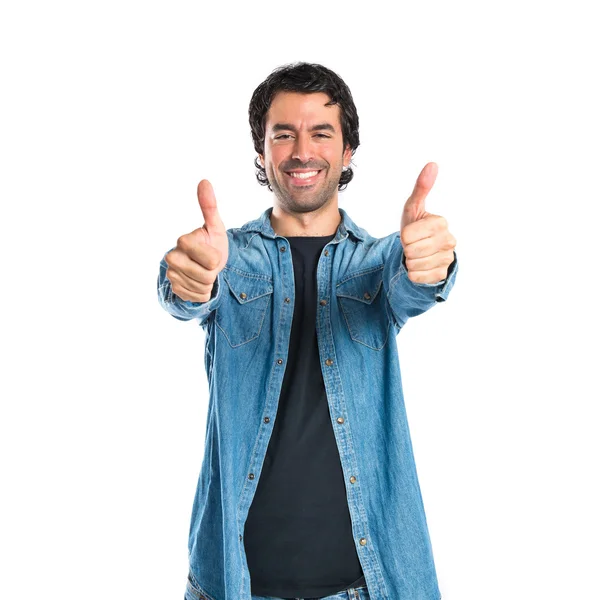 Hombre con pulgar hacia arriba sobre fondo blanco —  Fotos de Stock