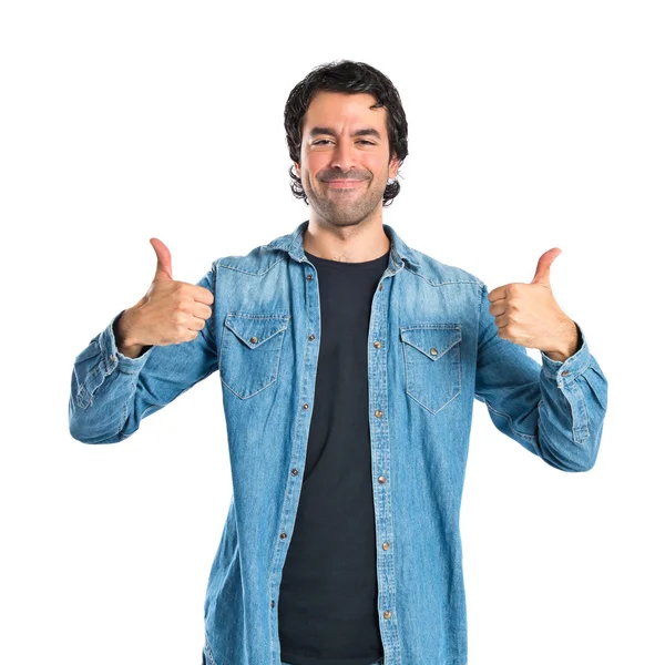 Hombre con pulgar hacia arriba sobre fondo blanco — Foto de Stock