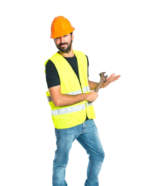 Workman with wrench over white background — Stock Photo, Image