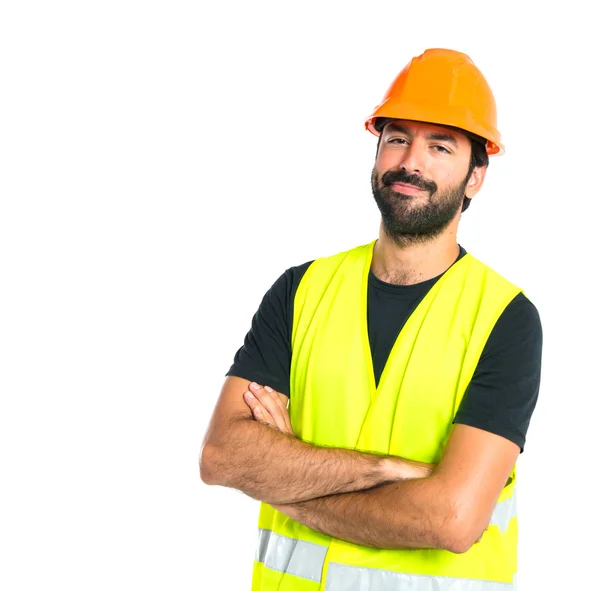 Arbeiter mit verschränkten Armen vor weißem Hintergrund — Stockfoto