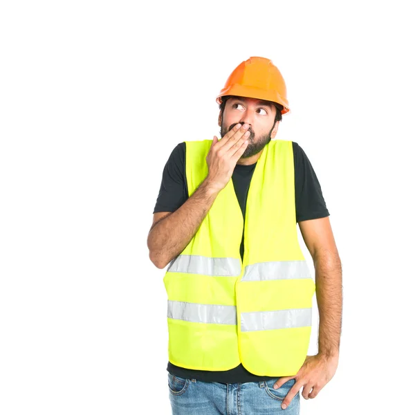 Workman doing surprise gesture over white background — Stock Photo, Image