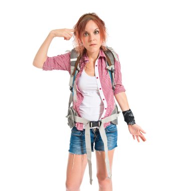 backpacker making crazy gesture over white background