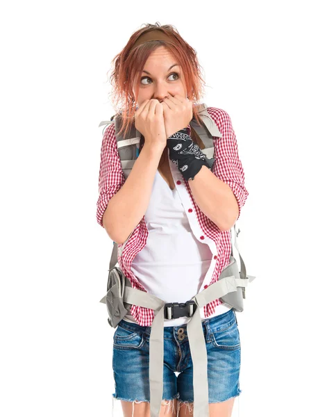 Frightened backpacker over isolated white background — 图库照片