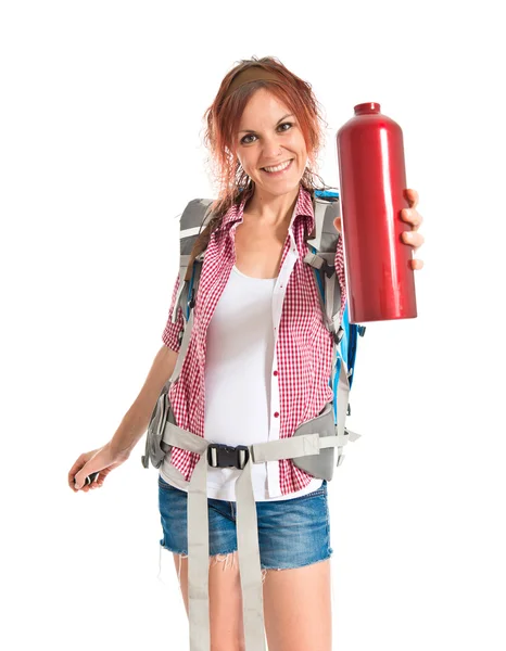 Woman with canteen over white background — Stock Photo, Image