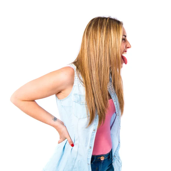 Mädchen macht einen Witz über isolierten weißen Hintergrund — Stockfoto