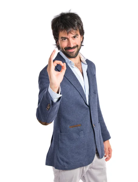 Businessman making Ok sign over white background — Stock Photo, Image