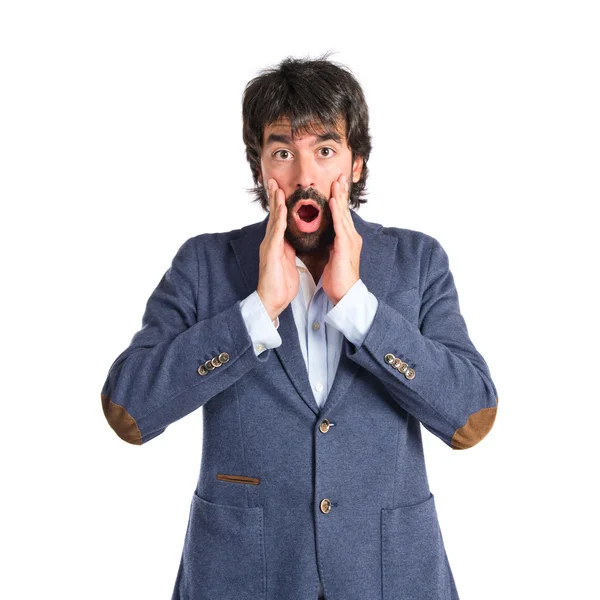 Man doing surprise gesture over white background — Stock Photo, Image