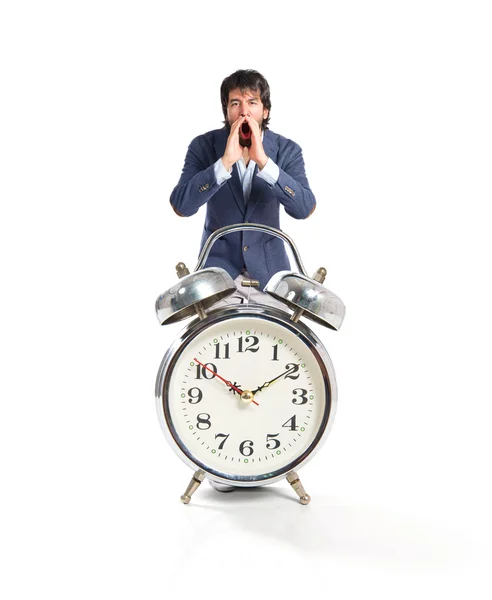 Handsome man shouting over isolated white background — Stock Photo, Image