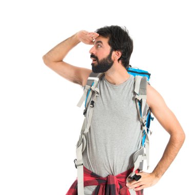 bir şey beyaz arka plan üzerinde gösterilen backpacker