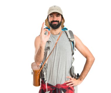 Backpacker Tamam beyaz arka plan üzerinde kayıt yapma
