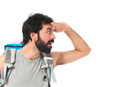 bir şey beyaz arka plan üzerinde gösterilen backpacker