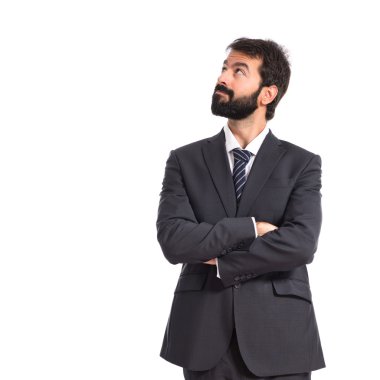 İş adamı izole beyaz arka plan üzerinde düşünme