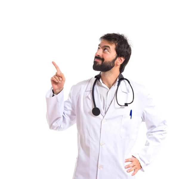 Médico pensando sobre fundo branco isolado — Fotografia de Stock