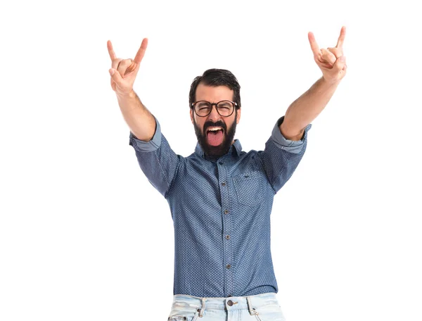 Joven hipster hombre haciendo gesto de cuerno —  Fotos de Stock