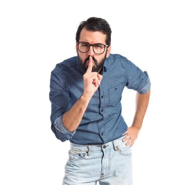 Jonge hipster man maakt stilte gebaar — Stockfoto