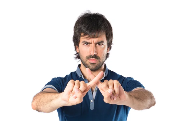 Man doing NO gesture over white background — Stock Photo, Image