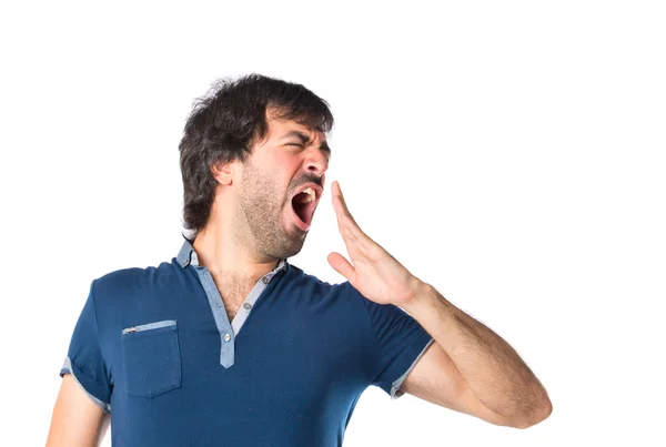 Homem bocejando sobre fundo branco isolado — Fotografia de Stock