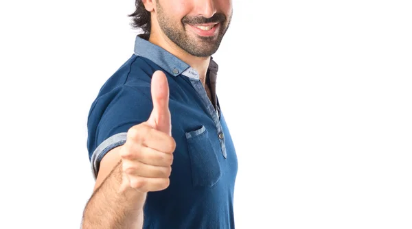 Man with thumb up over white background — Stock Photo, Image