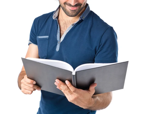 Man reading a book over white background — Stock Photo, Image