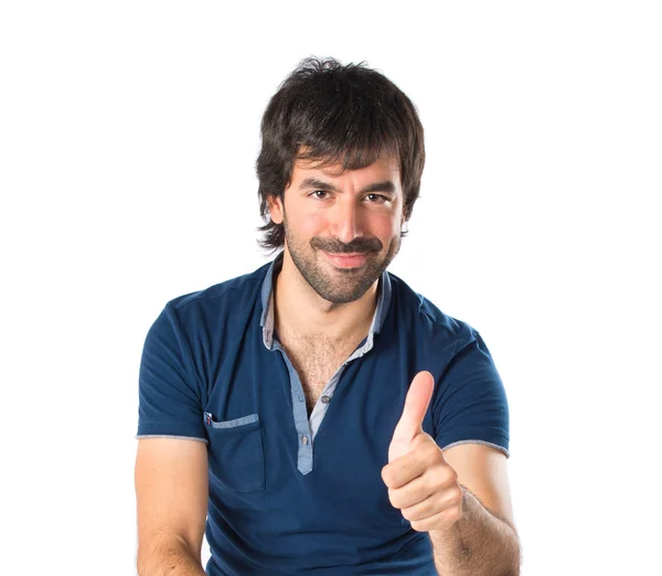 Hombre con pulgar hacia arriba sobre fondo blanco — Foto de Stock