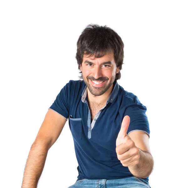 Hombre con pulgar hacia arriba sobre fondo blanco — Foto de Stock